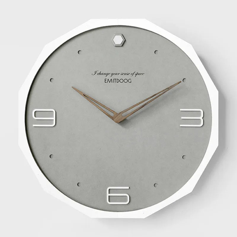 Round Nordic minimalist wall clock with perforated design, 12 inches diameter