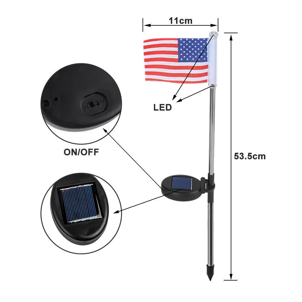White solar-powered garden flag light showing American flag design on stainless steel pole.