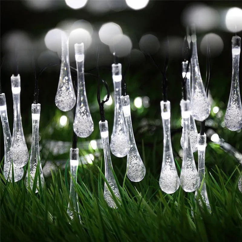 Solar-powered LED string lights with bubble drop pendants on 6.5 metre cable for outdoor garden decoration