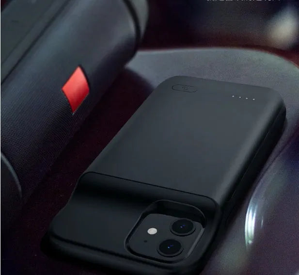 Black wireless back clip battery for iPhone 12 with ultra-thin TPU soft case showing multi-USB ports