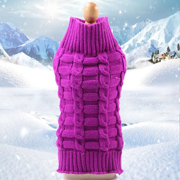 Twisted rope cashmere wool dog sweater in a V-neck style on a size chart showing measurements.
