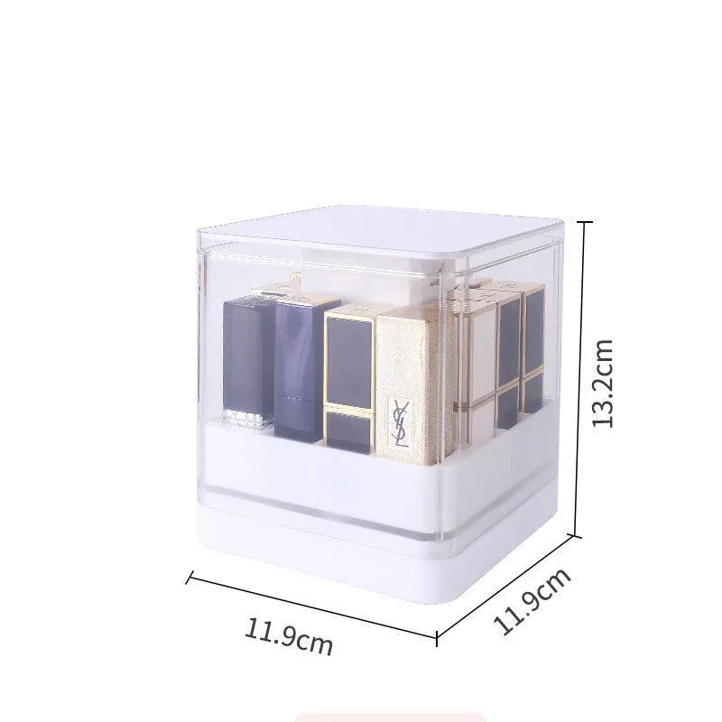 Pink press-lift lipstick storage box with dust cover open, showing 12 organised compartments.