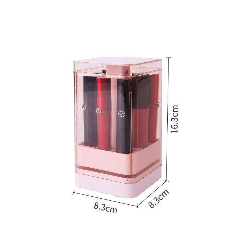 Pink press-lift lipstick storage box with dust cover open, showing 12 organised compartments.