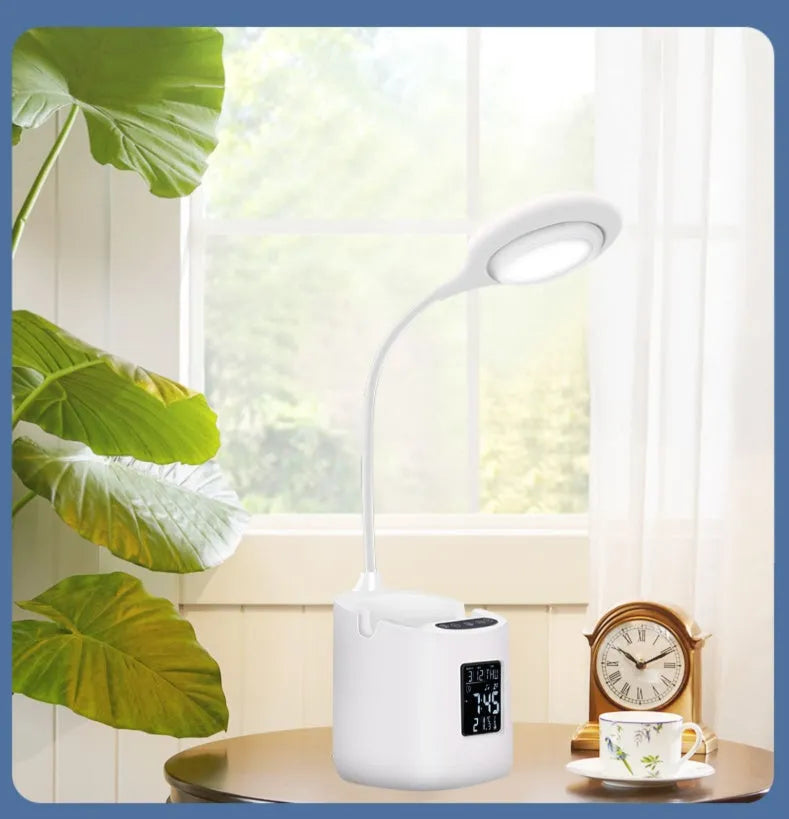 White desk lamp with touch controls and USB power cable for eye-protected studying