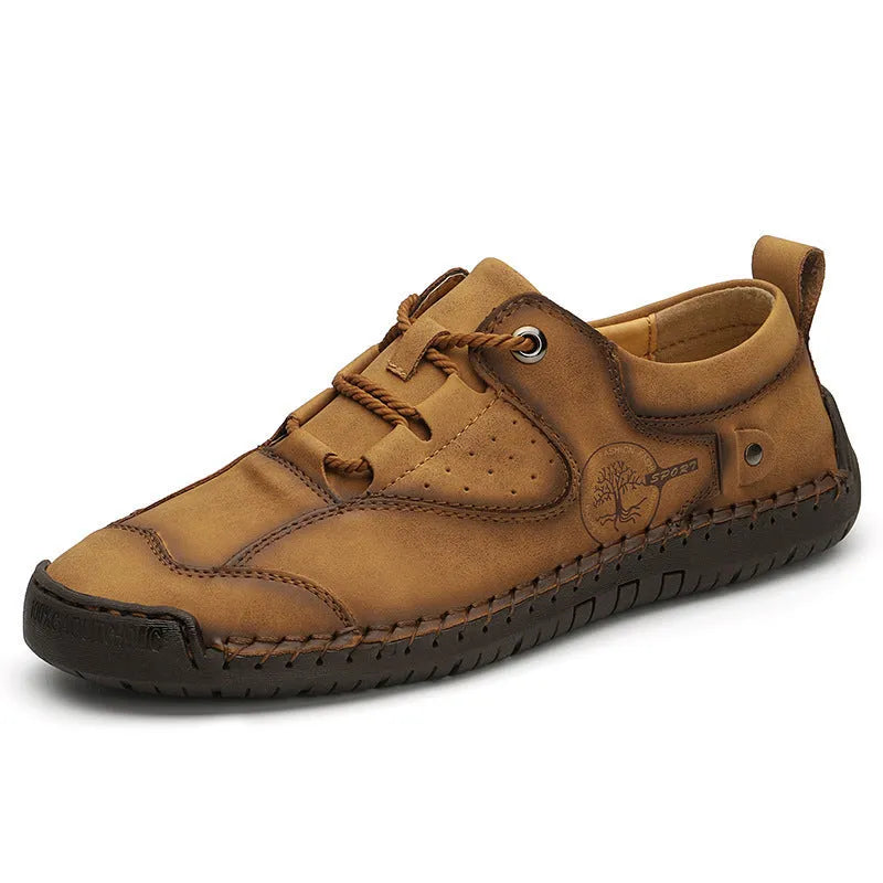 Men's black casual leather shoes with microfiber upper and round toe on a plain background