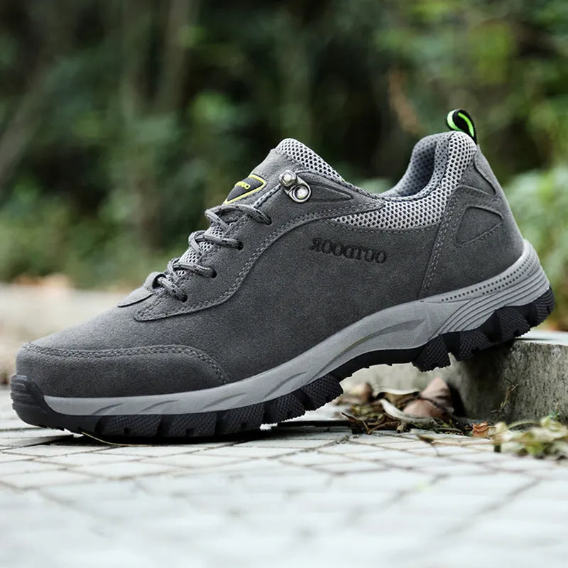 Men's low-top outdoor hiking shoes in army green with mesh upper detail and rubber sole.