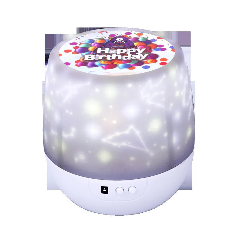 Starry sky projector lamp with plastic shade showing cosmos projection pattern on wall