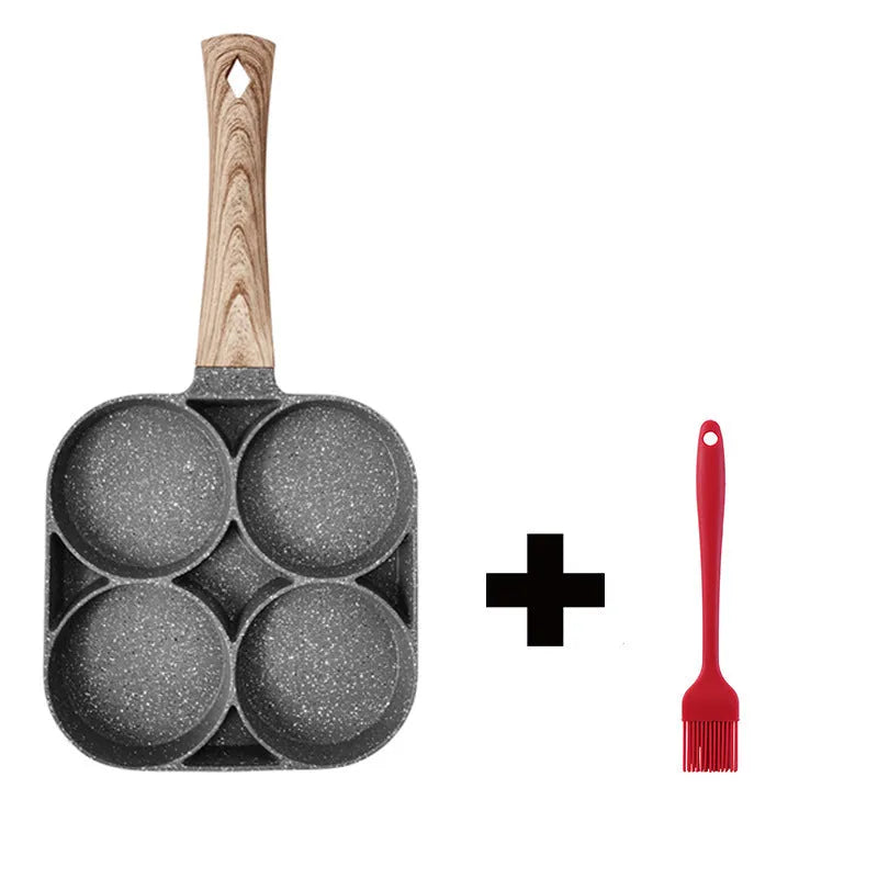 Non-stick four-hole frying pan with medical stone coating on a gas hob cooking eggs and pancakes