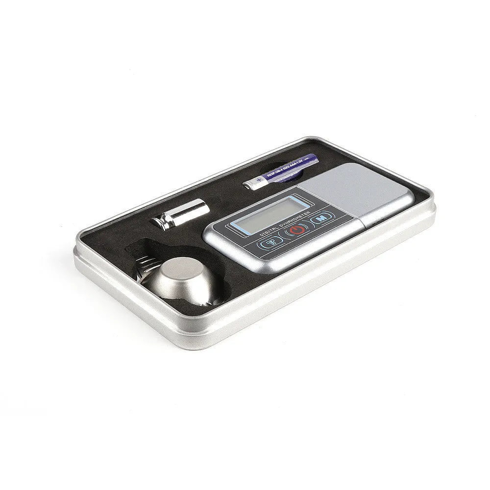 Precision electronic gram scale with digital display, 100g capacity, for weighing jewellery and grains.