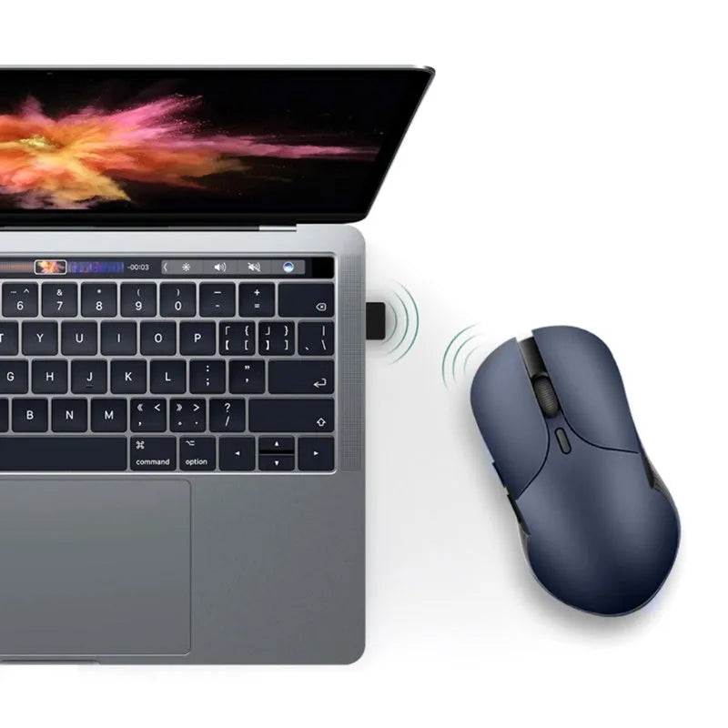 Blue Smart Voice Mouse with 2.4G USB receiver on a desk.