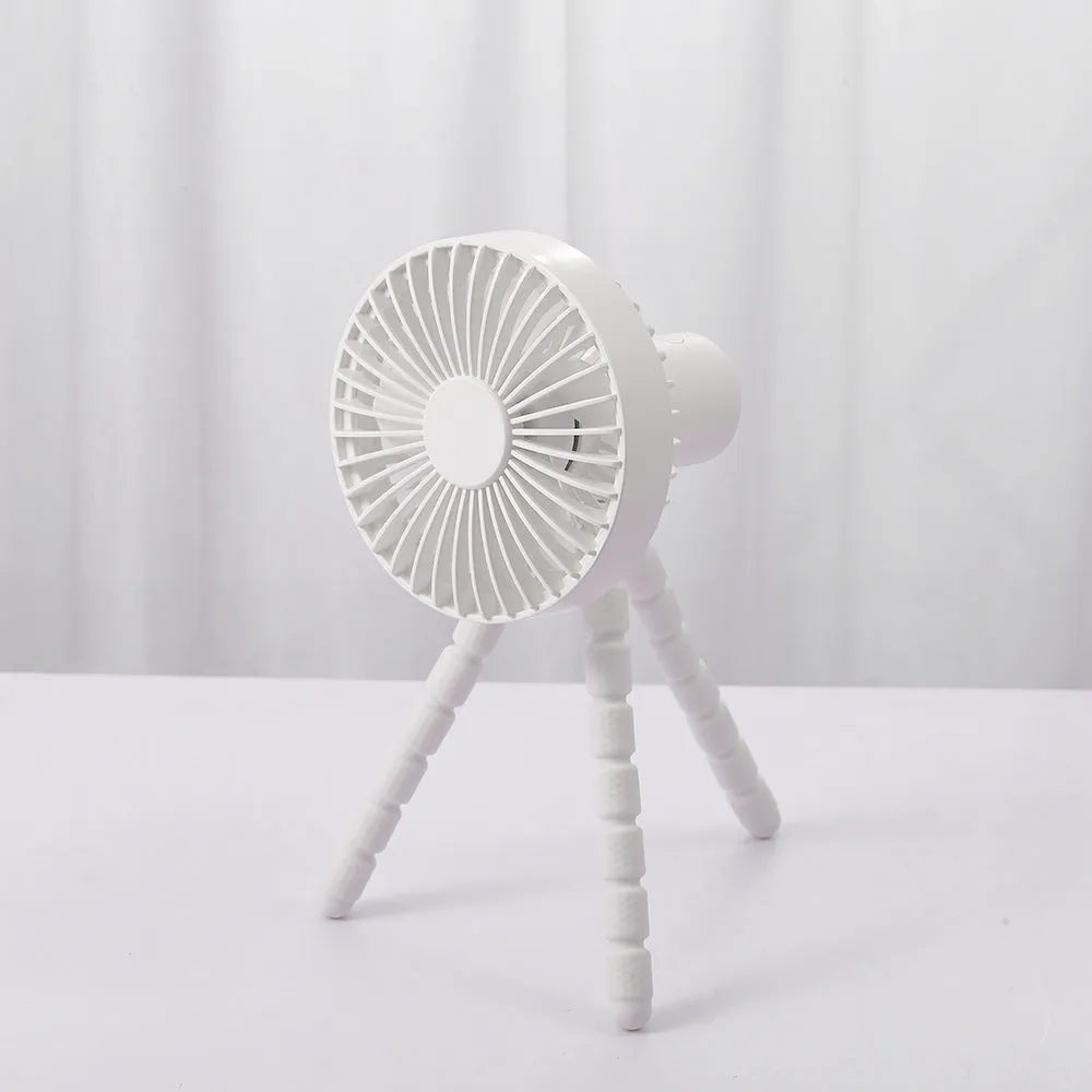 Small white desk fan with bending head on a black octopus tripod base