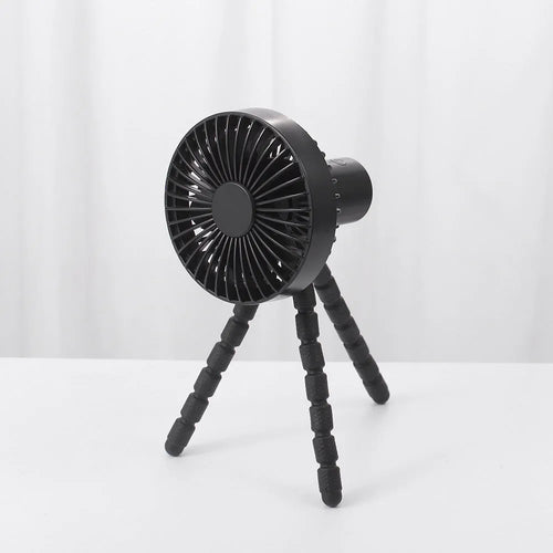 Small white desk fan with bending head on a black octopus tripod base