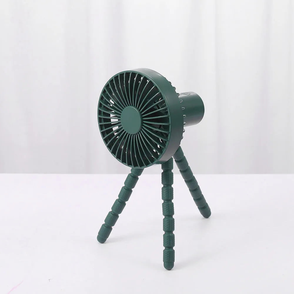 Small white desk fan with bending head on a black octopus tripod base