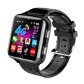 Children's smart watch with colourful silicone strap on a wrist, showing a 1.54-inch screen.