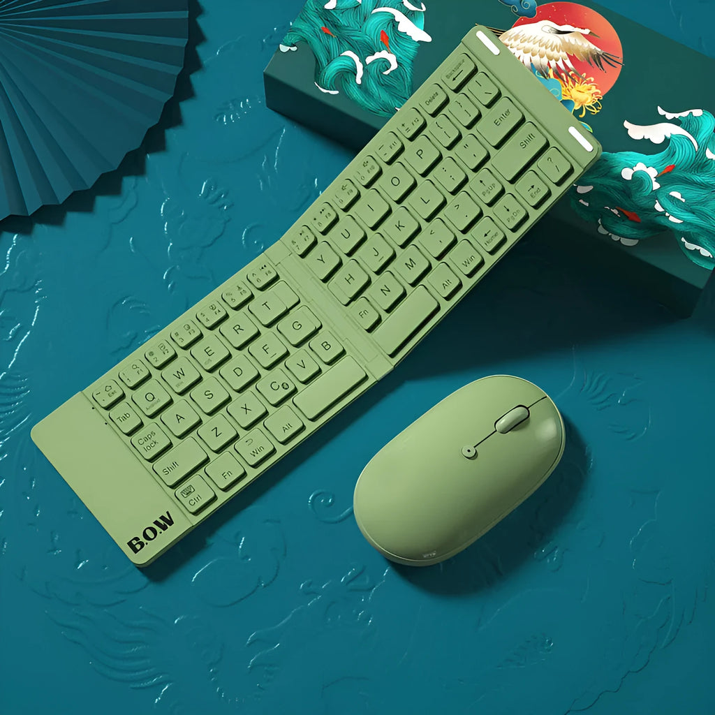 Folding Bluetooth keyboard and mouse set in elegant white, with full-sized keys and touchpad, folded for portability.