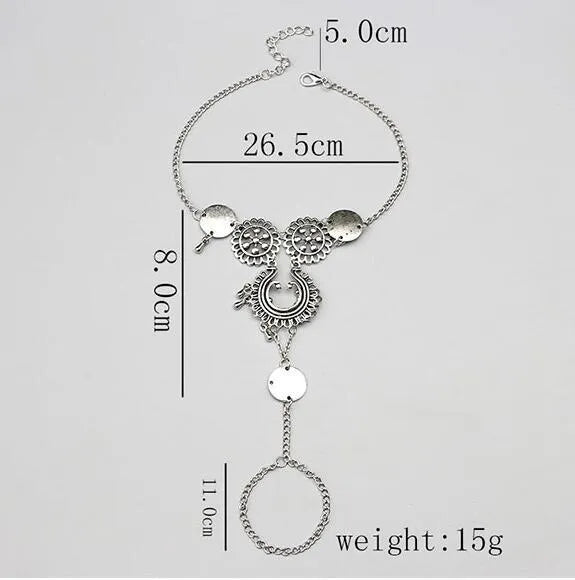 Antique silver hollow flower chain anklet with teardrop shape on a surface, 24cm foot jewellery for women