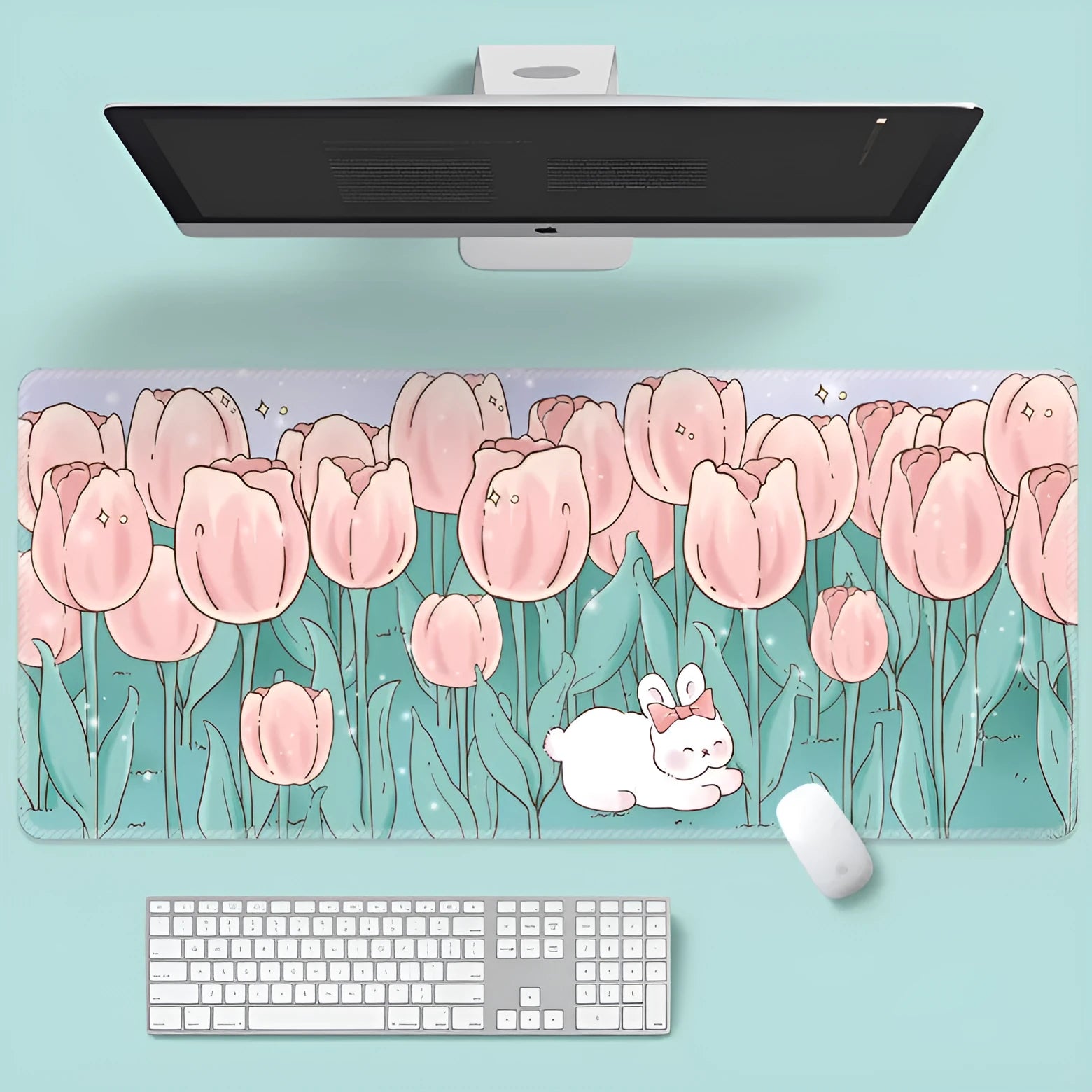 Large floral pattern mouse pad on a desk with keyboard and mouse, showing non-slip rubber base.