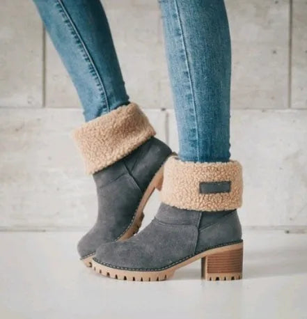 Women's suede mid-tube snow boots in black with a thick low heel and beef tendon sole.