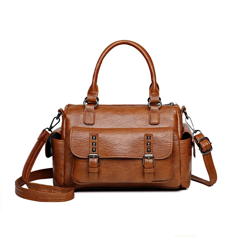 Vintage-style large square messenger bag in PU leather with contrast stitching.
