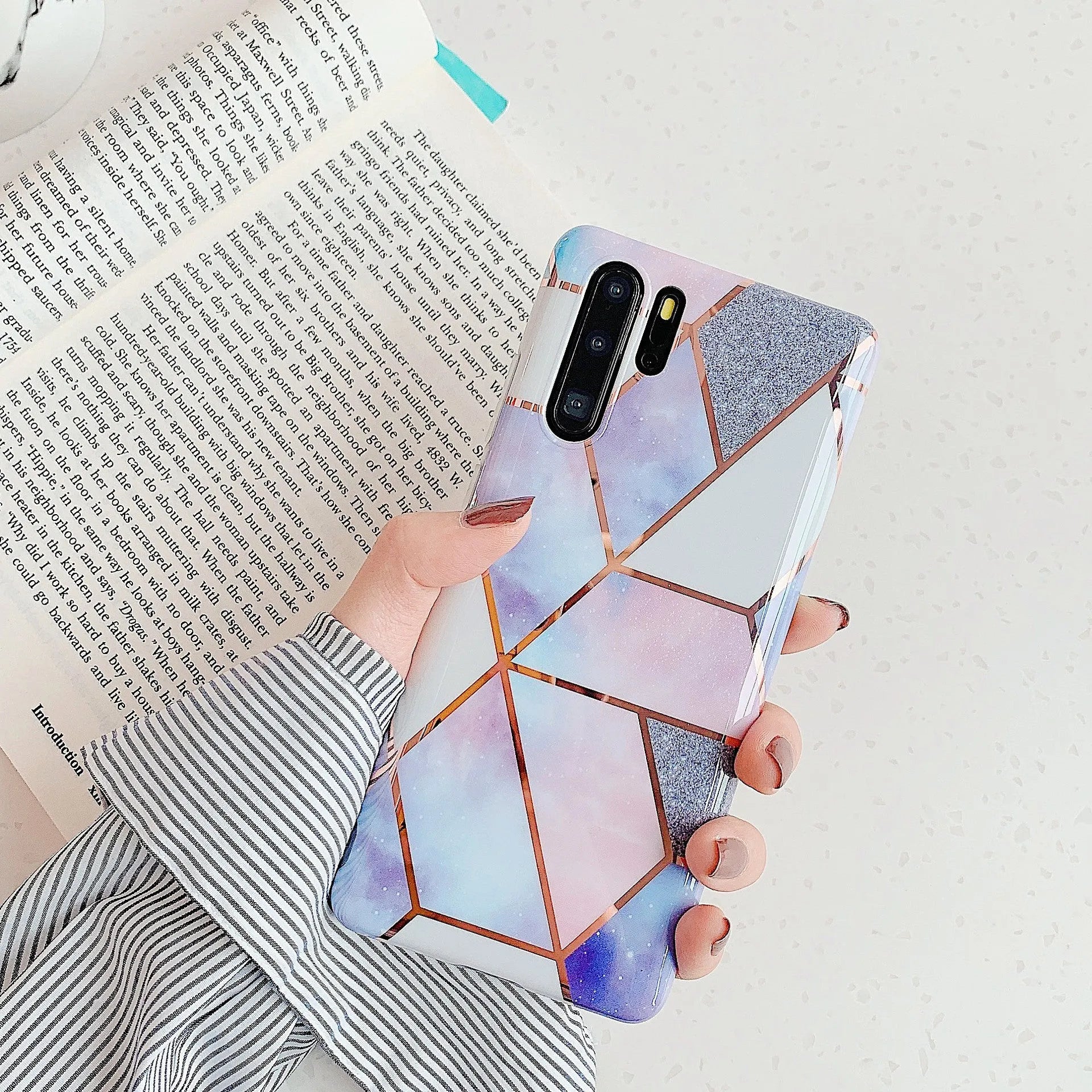 Electroplated marble finish TPU back cover case for Huawei and Samsung smartphones in multiple colours.