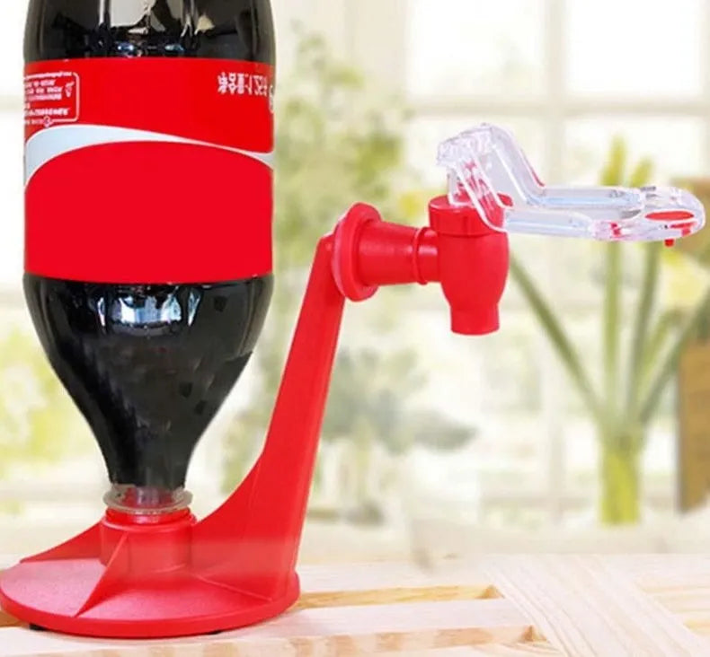 Red plastic Magic Tap soda dispenser attached to 2-litre bottle for push-button pouring