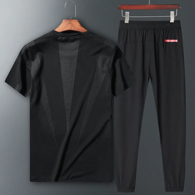 Two-piece short-sleeved sportswear set in black with round neck and nylon fabric