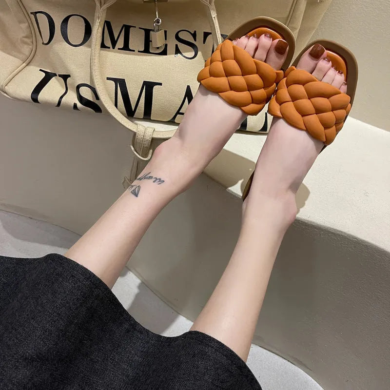 Women's plaid PVC beach sandals with thick anti-skid soles in black, green, orange and white.