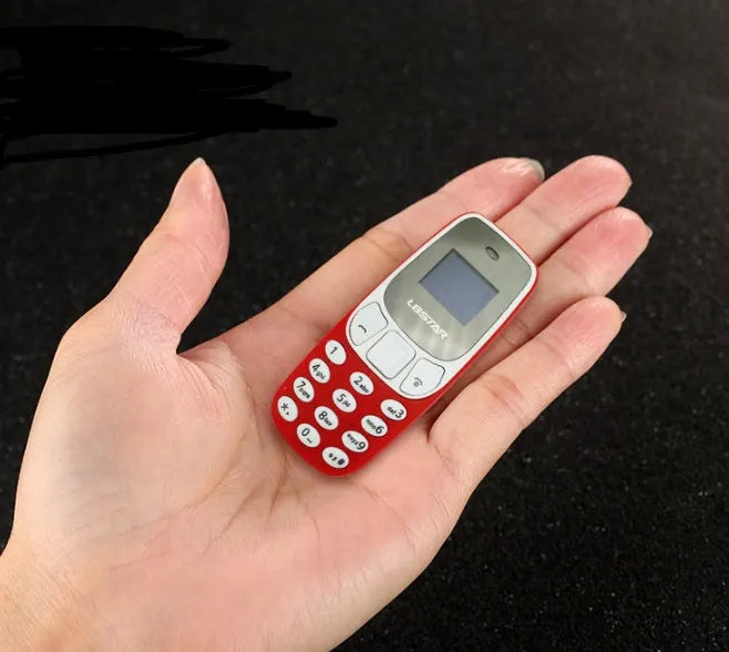 Ultra-small miniature thumb phone with 0.66-inch OLED display and dual SIM slots, blue colour