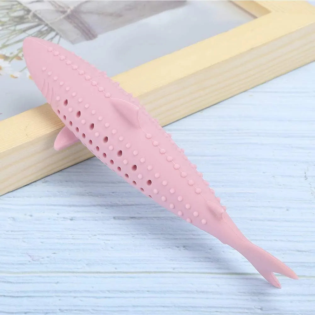 Green silicone fish-shaped chew toy for cats on a white background