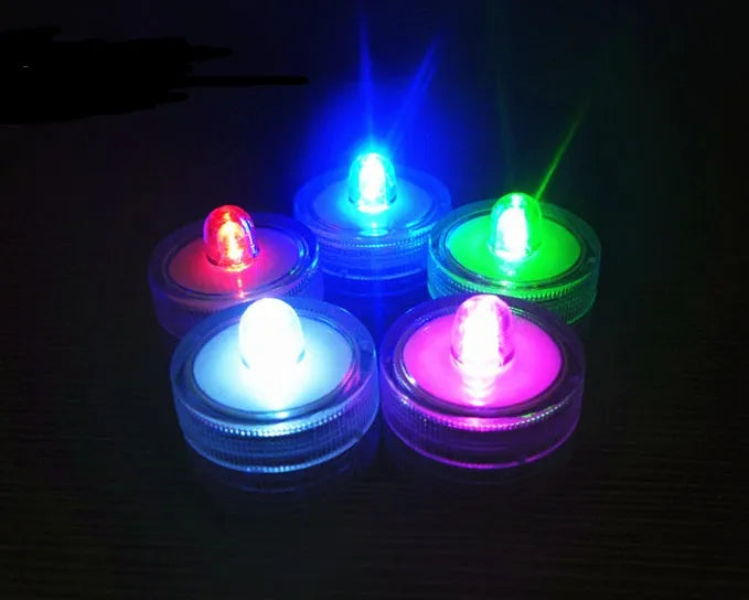 Set of colourful electronic candle lights with CR2032 battery, submersible, 3cm diameter, 2.6cm height, plastic housing