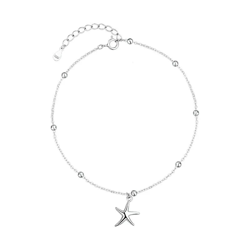 Women's sterling silver S925 anklet with a starfish charm and round bead on an adjustable chain.