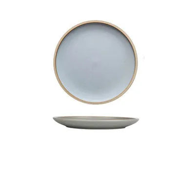 Pure blue matte finish 10-inch ceramic dinner plate on a table.