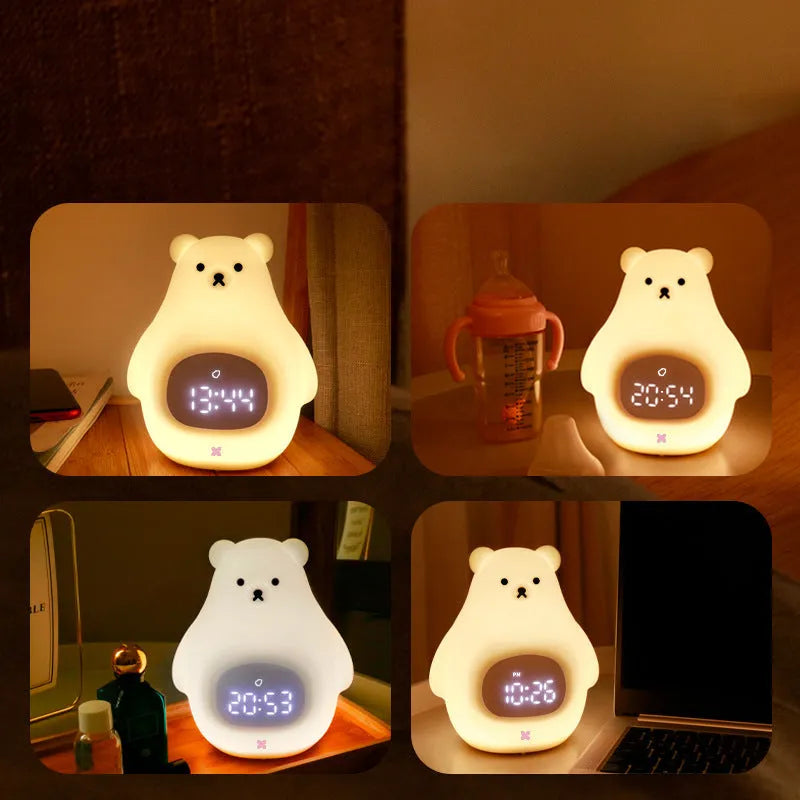 White silicone bear-shaped night light with a remote control on a wooden surface.