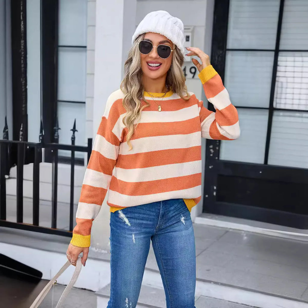 Women's loose fit long sleeve acrylic sweater in blue colour with striped pattern