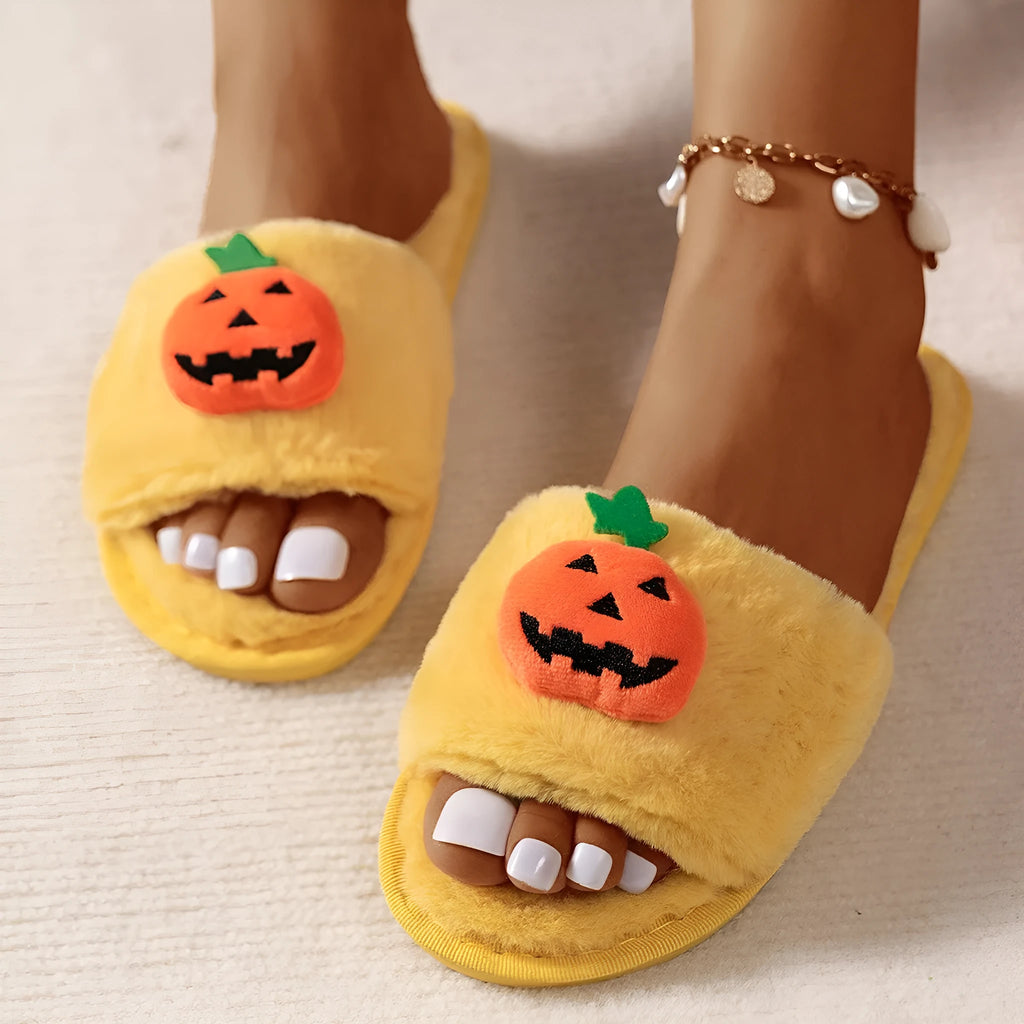 Yellow pumpkin cartoon design open-toe slippers with plush synthetic fur upper.