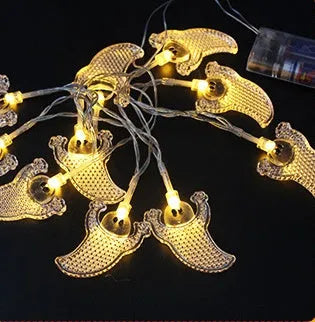 Halloween LED string lights with pumpkin, bat and ghost decorations showing colour changing illumination