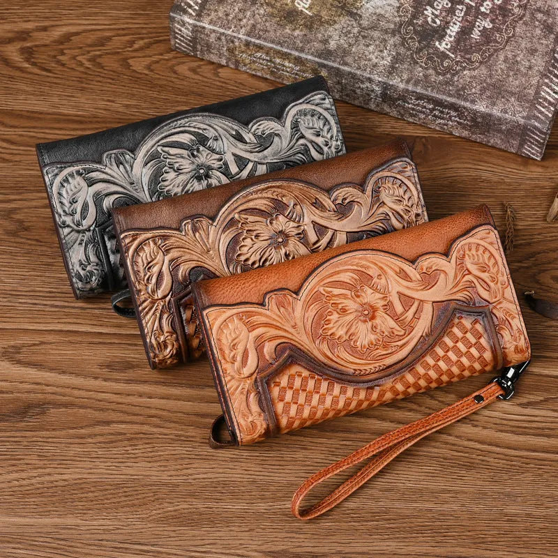 Chinese style brown leather tri-fold wallet with a floral embossed pattern, shown open to reveal compartments.