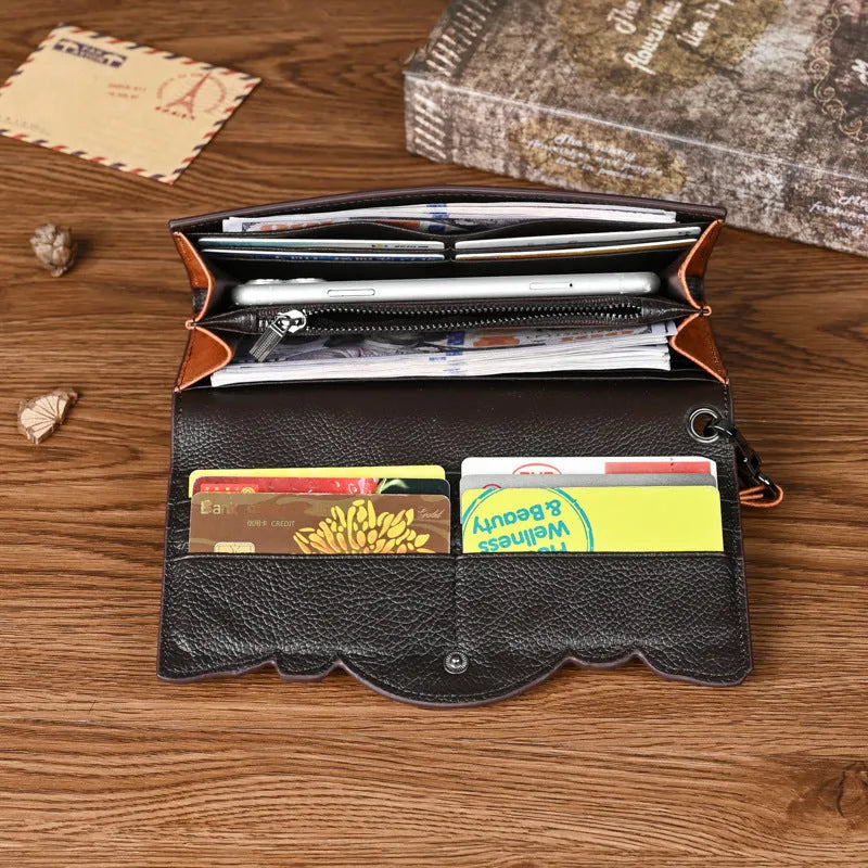 Chinese style brown leather tri-fold wallet with a floral embossed pattern, shown open to reveal compartments.