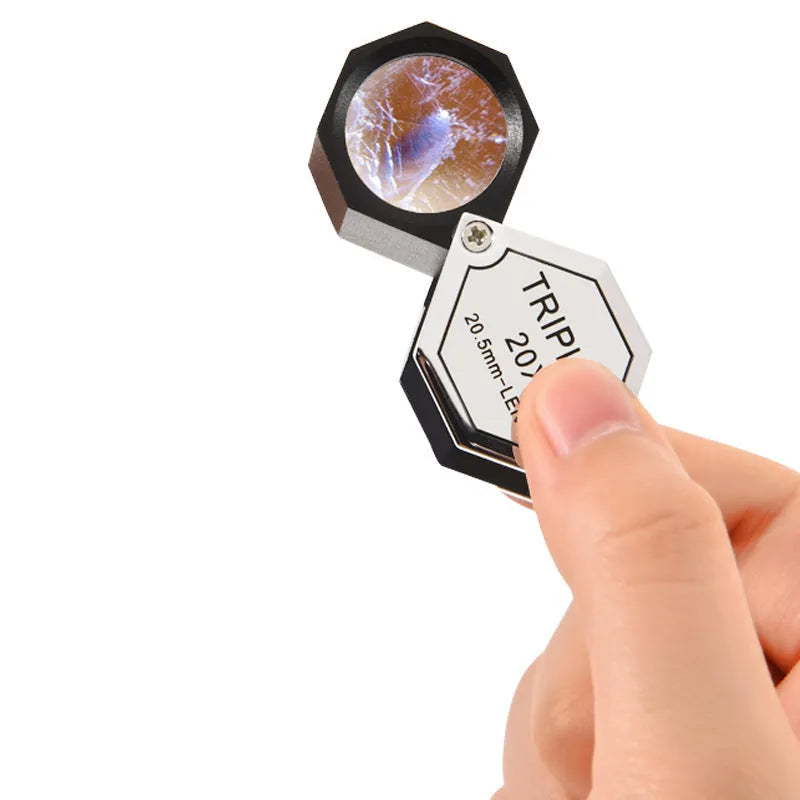Handheld metal magnifying glass with optical glass lens for jewellery and stamp inspection