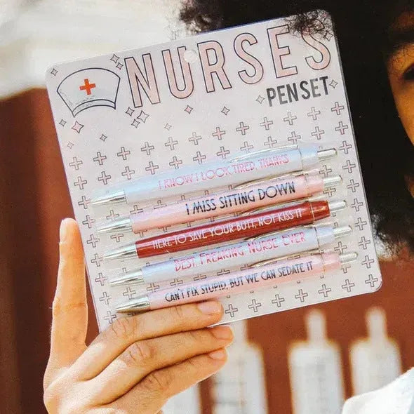 Set of five nurse-themed retractable ballpoint pens with medical designs showing plastic construction