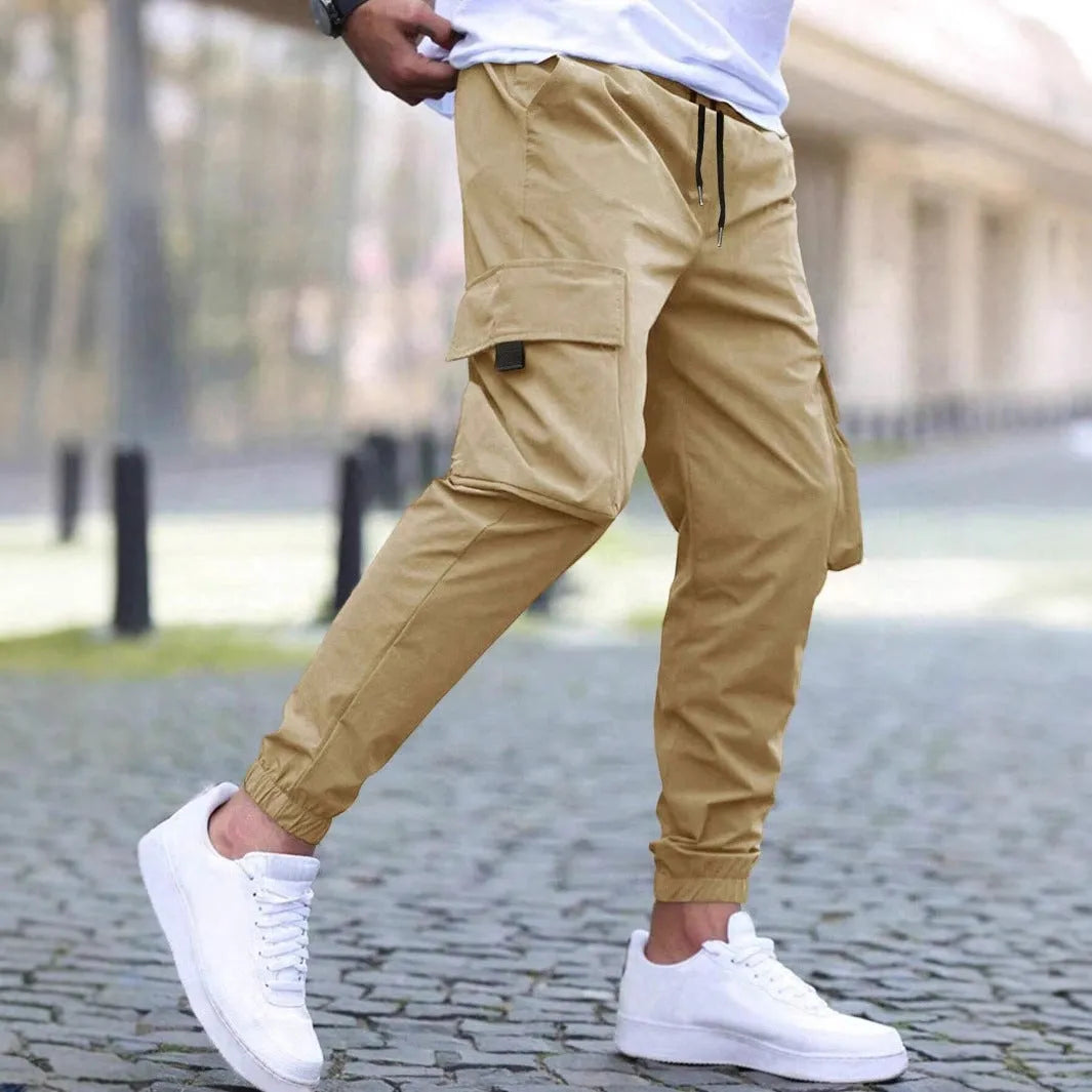 Workwear casual pants with drawstring elastic waist, solid colour, polyester fibre, skinny leg, black colour option