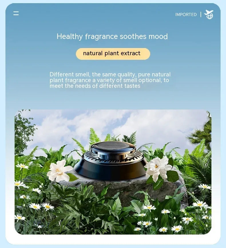 Solar powered kinetic car air freshener with rotating double rings on black plastic base