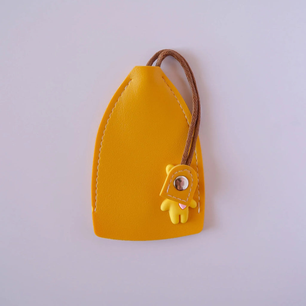 Black PU leather universal car key case with large capacity and anti-theft storage.