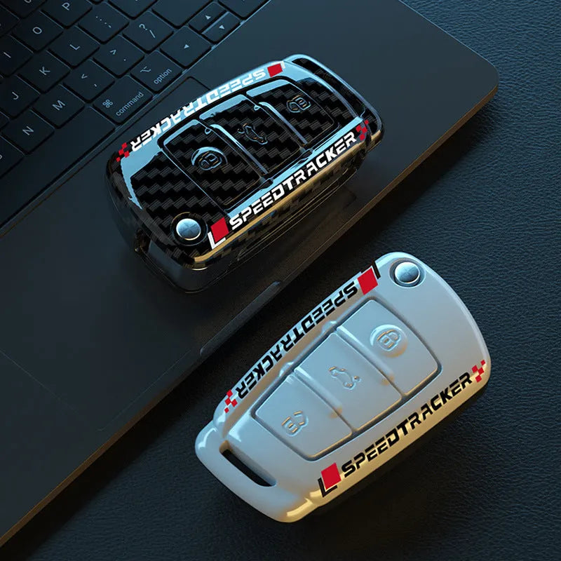 Carbon fibre style car key cover with mirror element in carbon and white colour options
