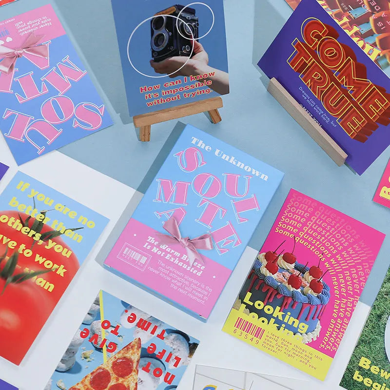 Fresh printed postcard set showing two different designs - Time Not Arrived and Warm Wind Not Exhausted greeting cards