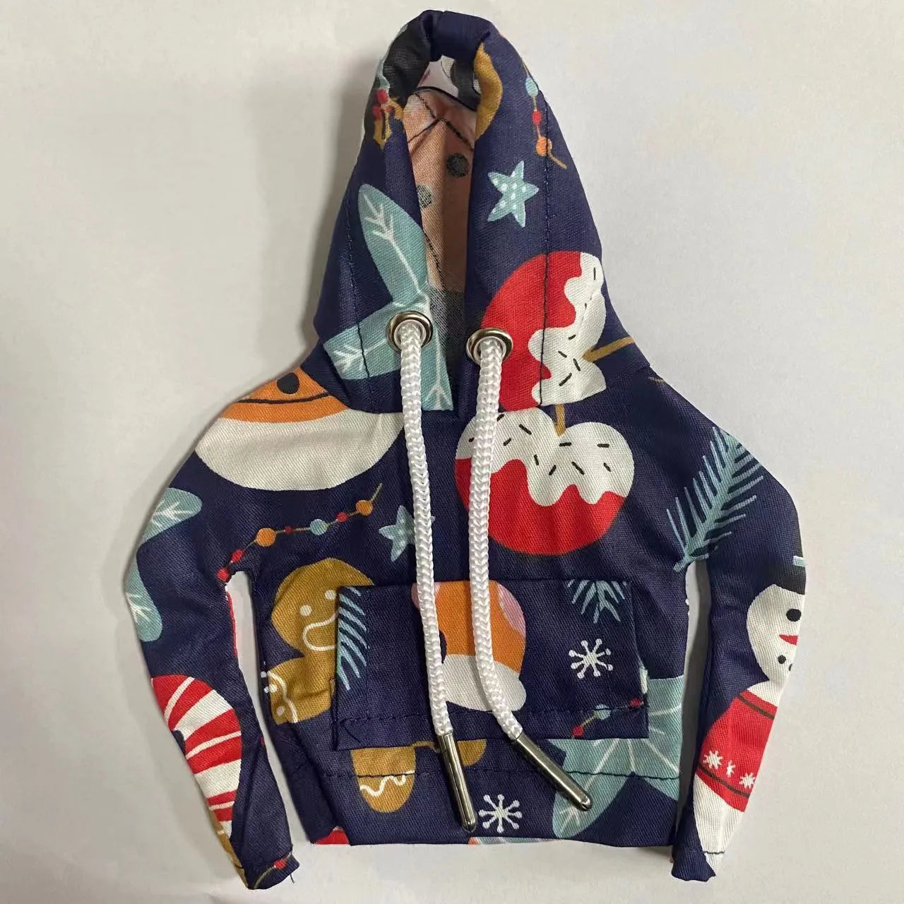 Multicolour cotton handbrake cover hooded over a car gear lever.