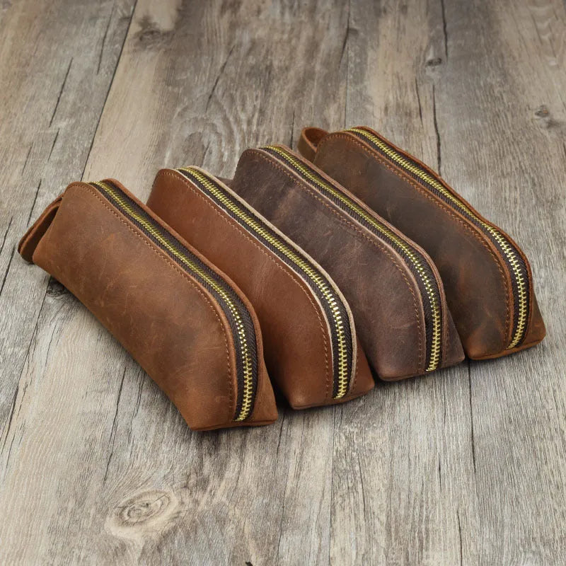 Handmade cowhide leather pencil case in rectangular shape with zipper closure