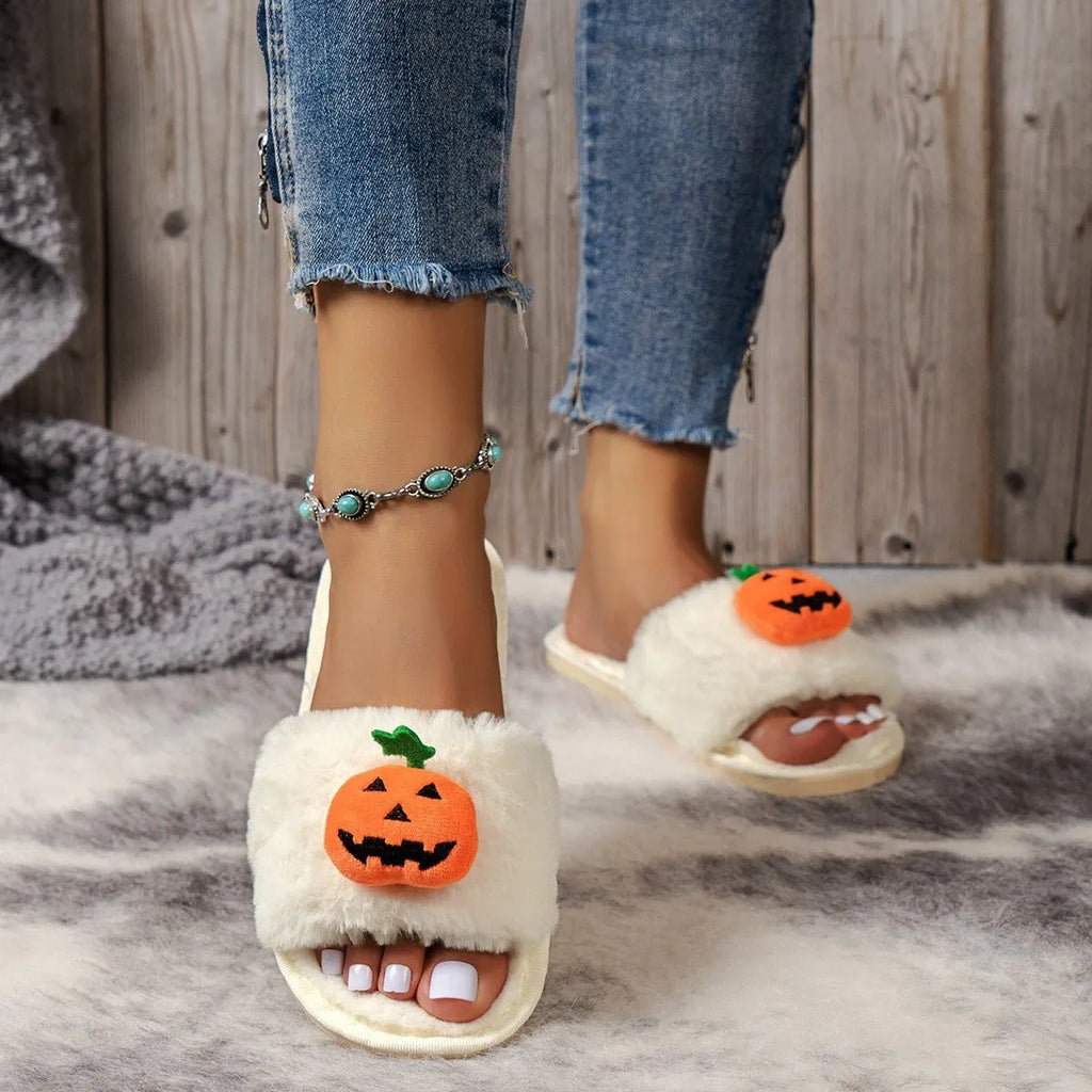 Yellow pumpkin cartoon design open-toe slippers with plush synthetic fur upper.