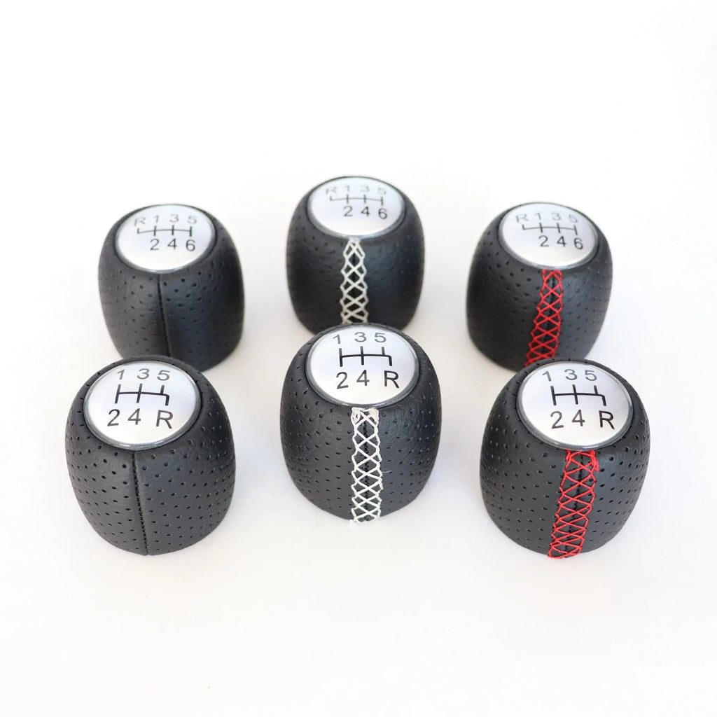 Sewn wrapped perforated PU leather handball gear for Alpha vehicles in black, red, or white.