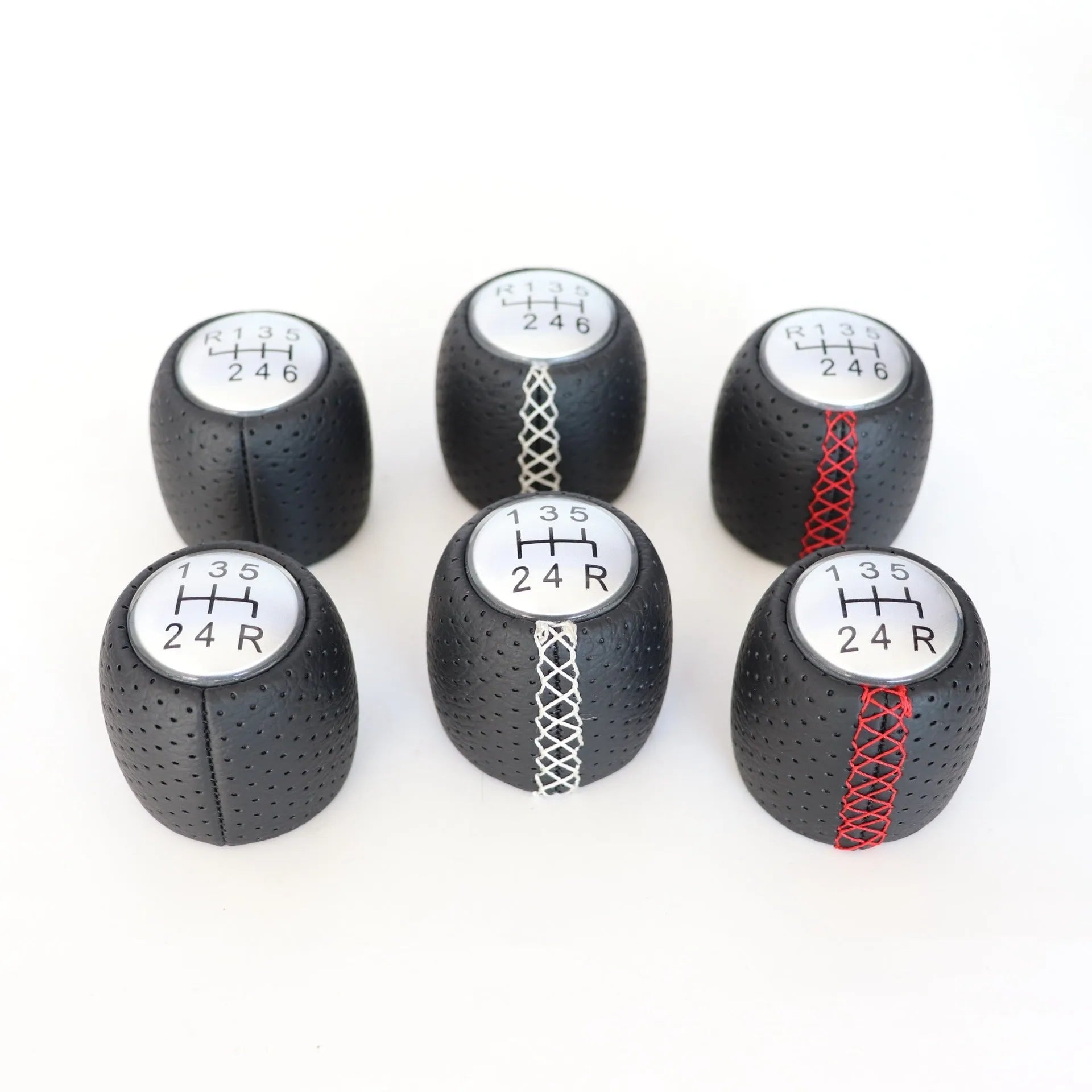 Sewn wrapped perforated PU leather handball gear for Alpha vehicles in black, red, or white.
